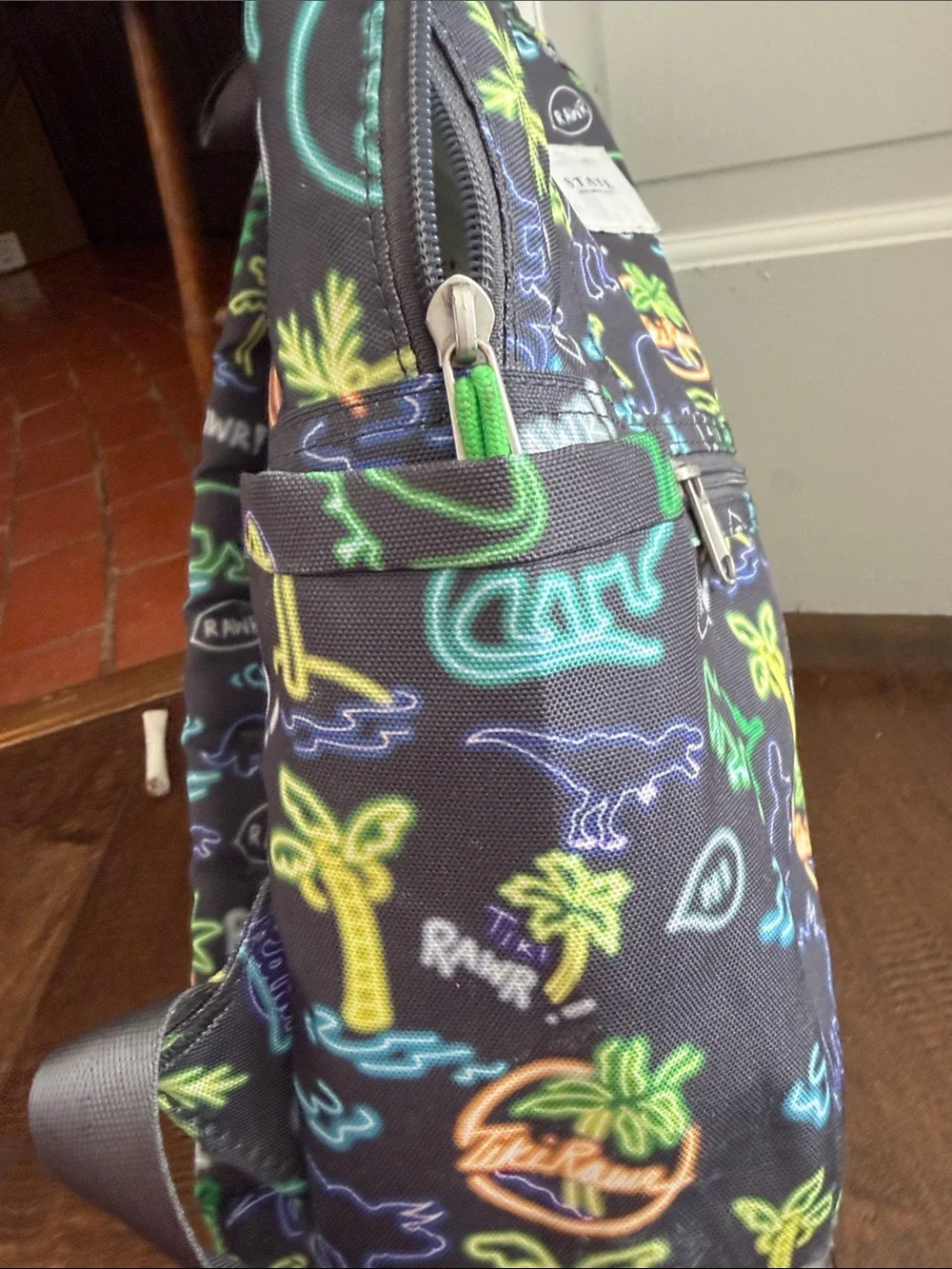 STATE Kids Neon Dino Mini Backpack - Black with Green, Yellow & Blue Accents